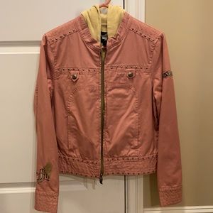 Harley Davidson jacket with vest underneath.